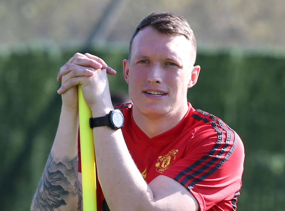 Phil Jones training with a yellow pole Wallpaper