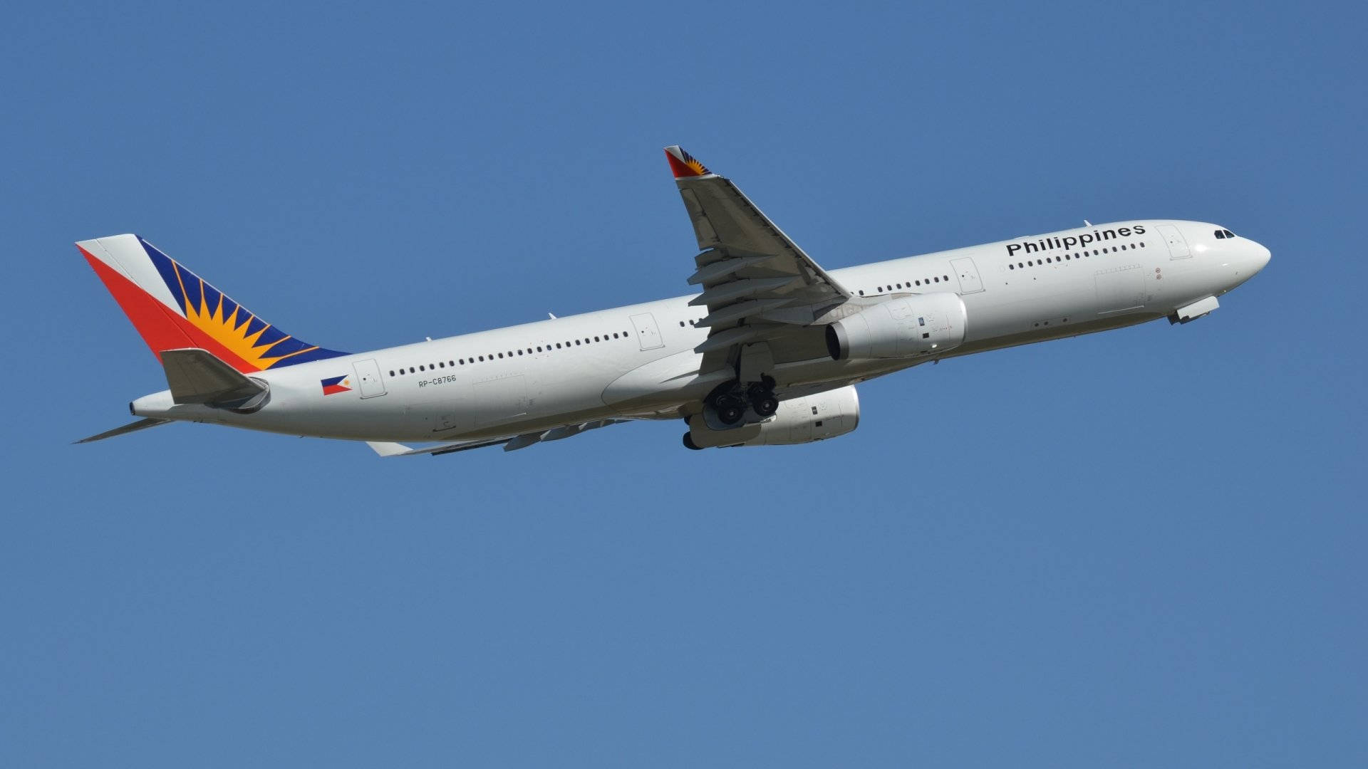Philippine Airlines Gliding Airplane Wings Wallpaper