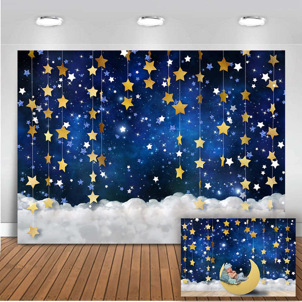 A Photo Backdrop With Stars And Moon