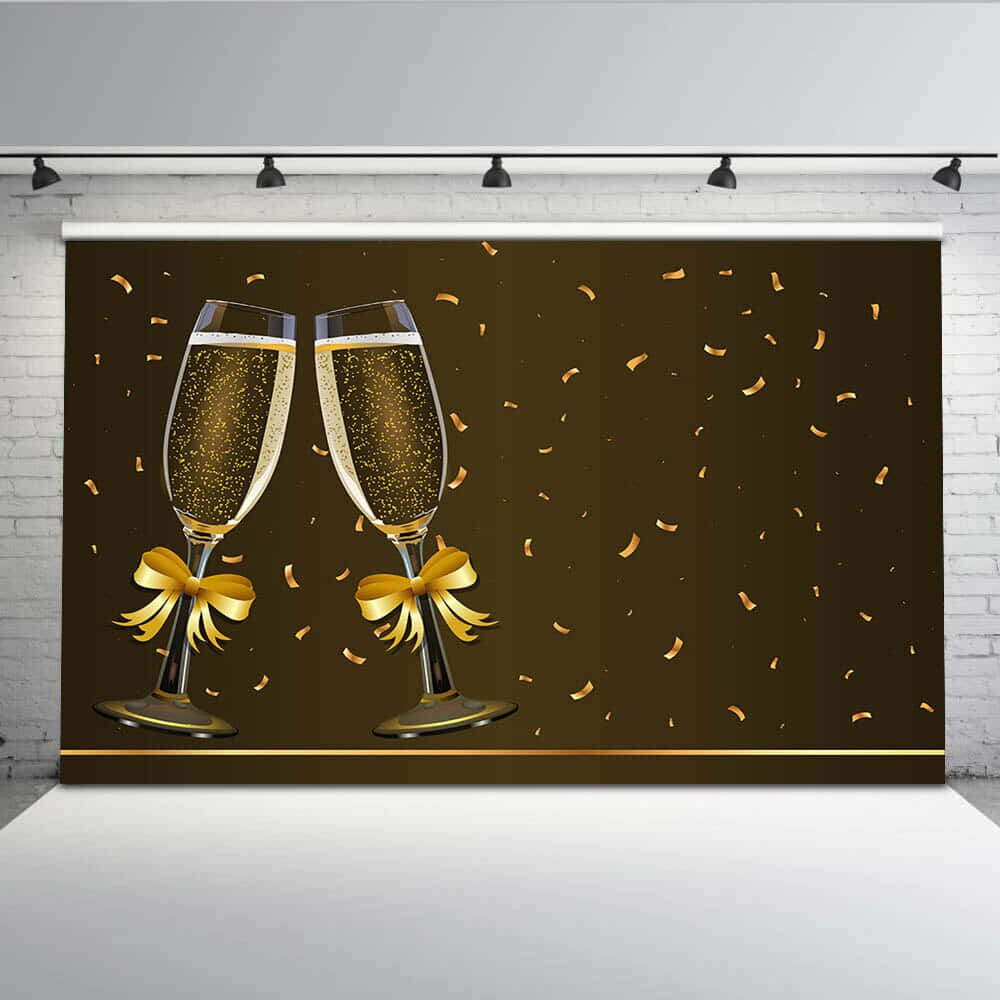 Two Champagne Glasses On A Wall With Gold Confetti