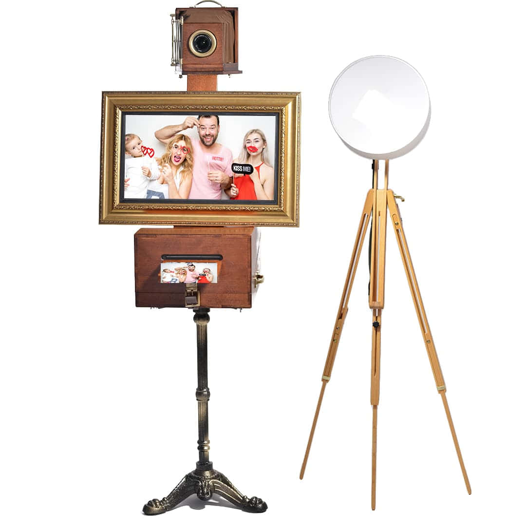 A Photo Booth With A Tripod And A Camera