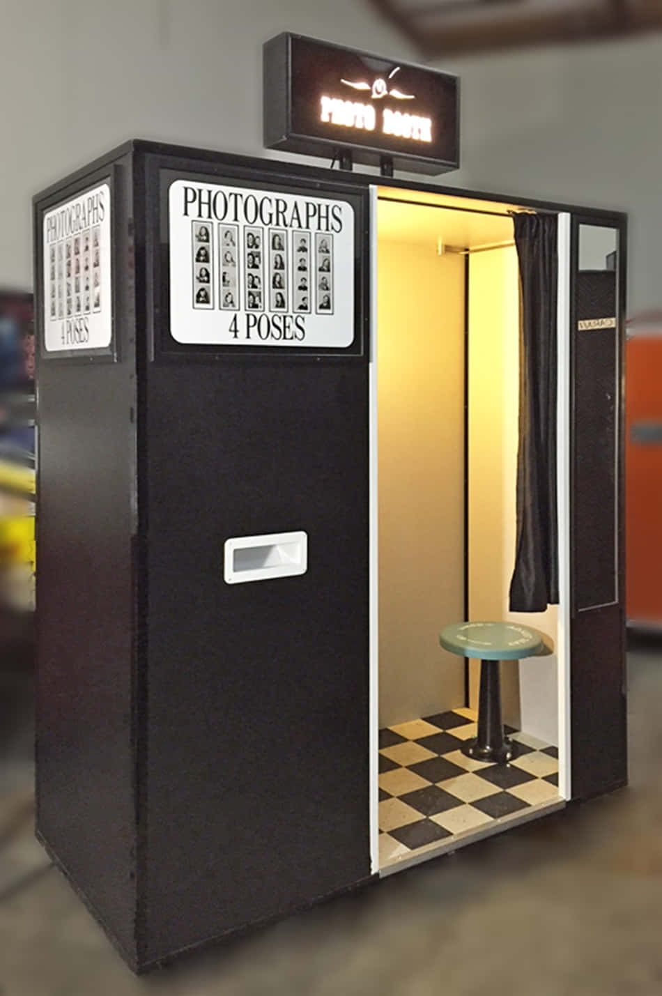A Photo Booth With A Checkered Floor