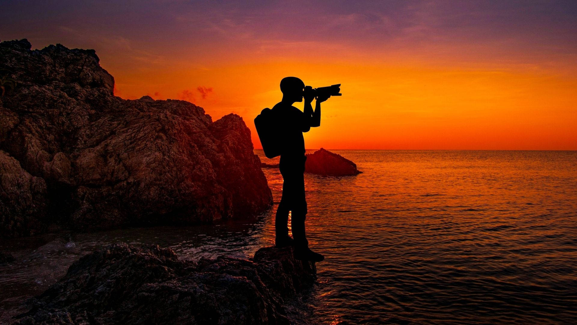 Photographer At Sunset Wallpaper
