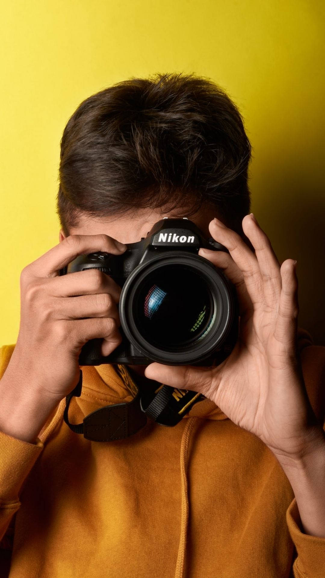 Photographer In Yellow Wallpaper