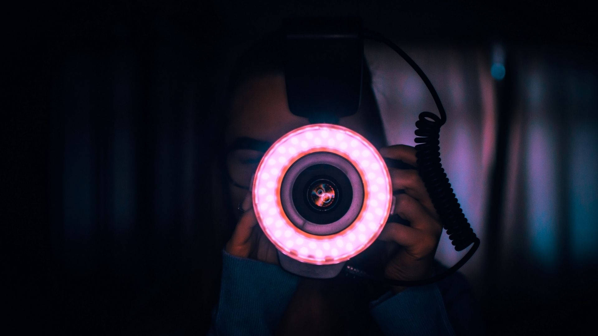 Photographer With Pink Ring Light Wallpaper