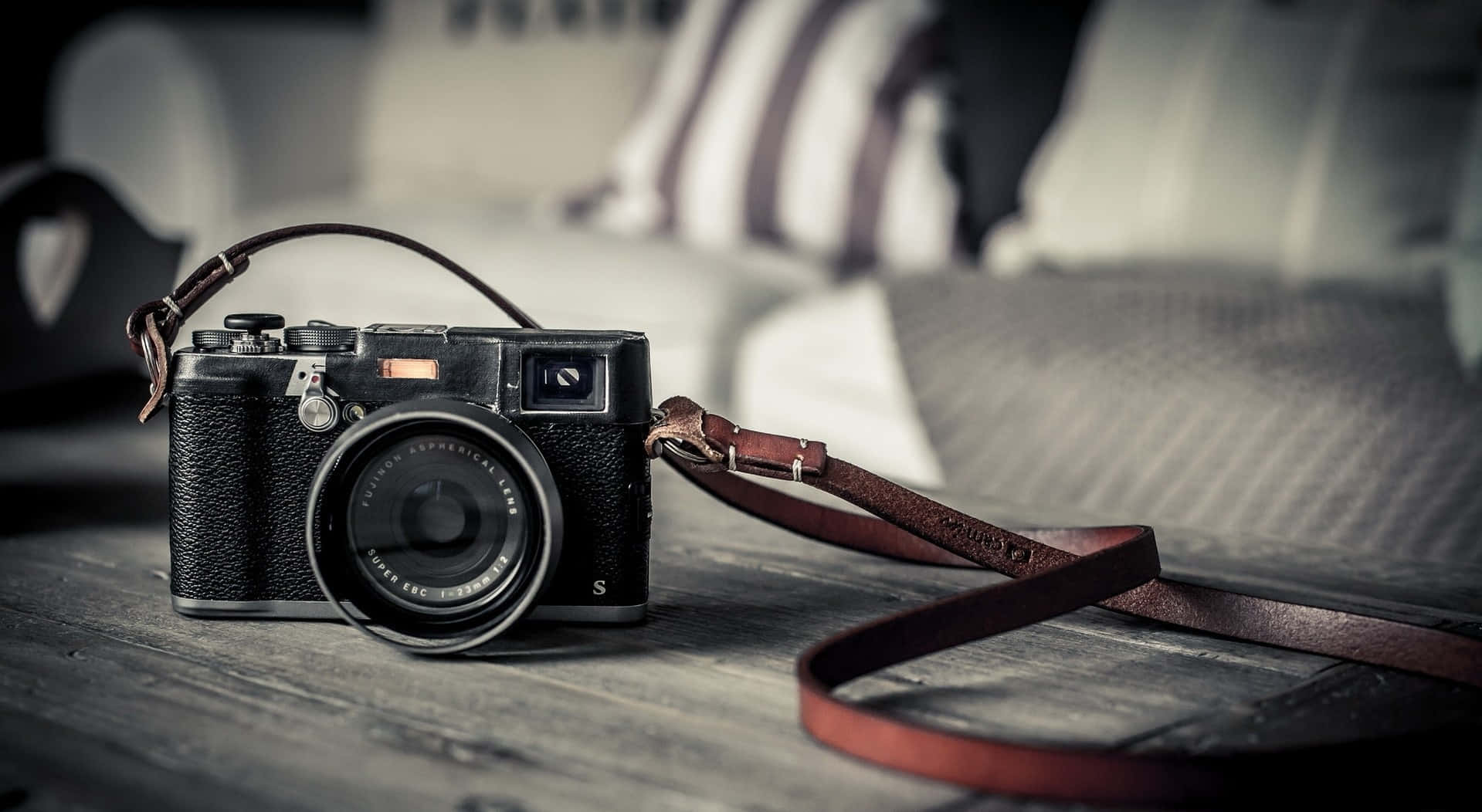 Photography Camera With Leatheer Strap Wallpaper