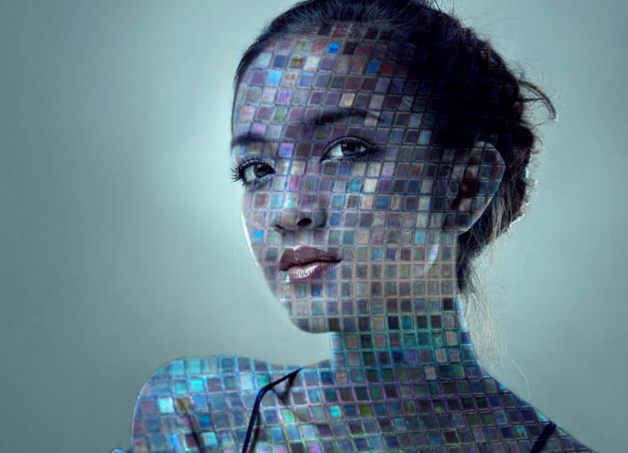 A Woman's Face Is Made Up Of Pixels
