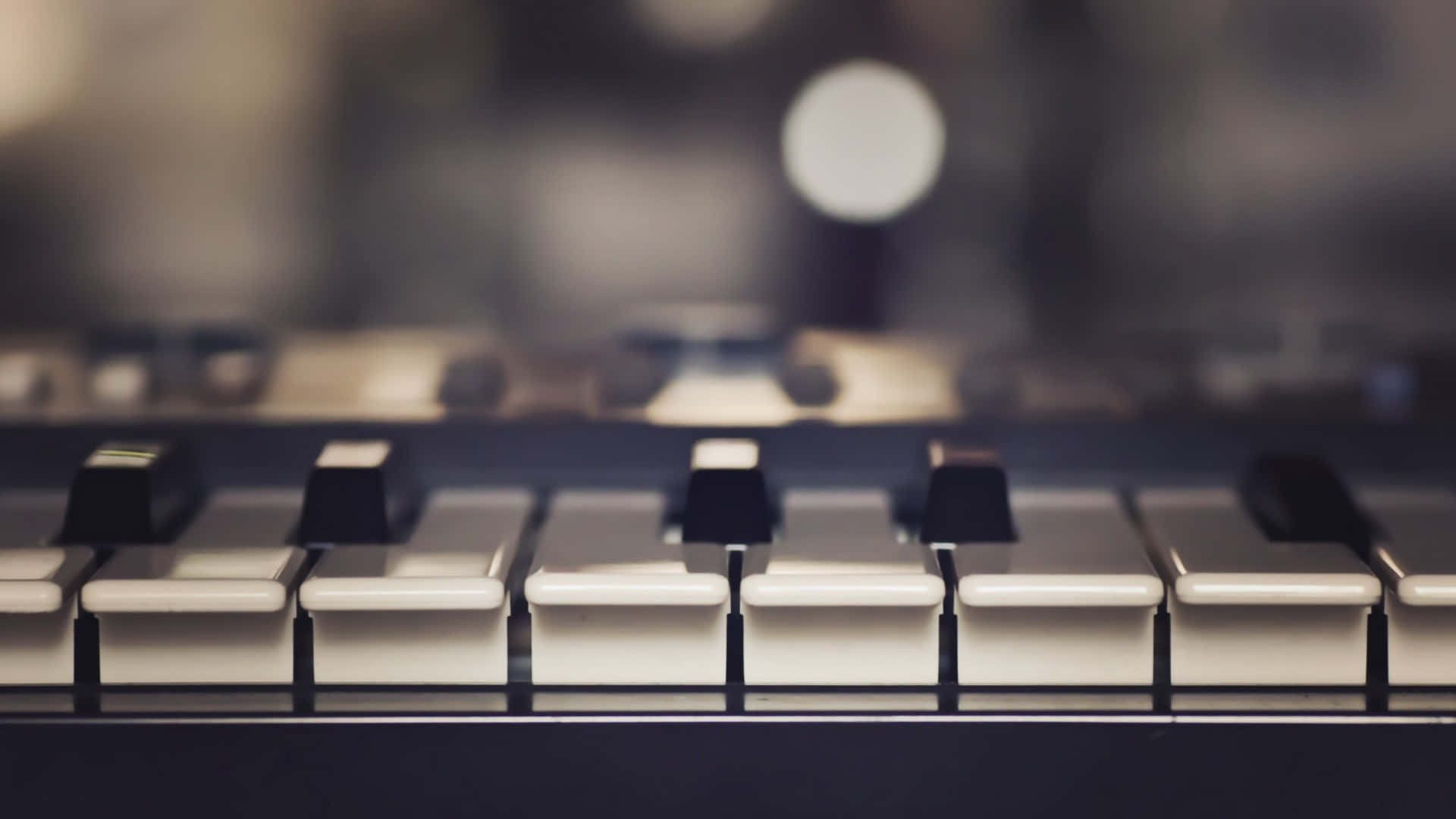 A Close Up Of A Piano Keyboard