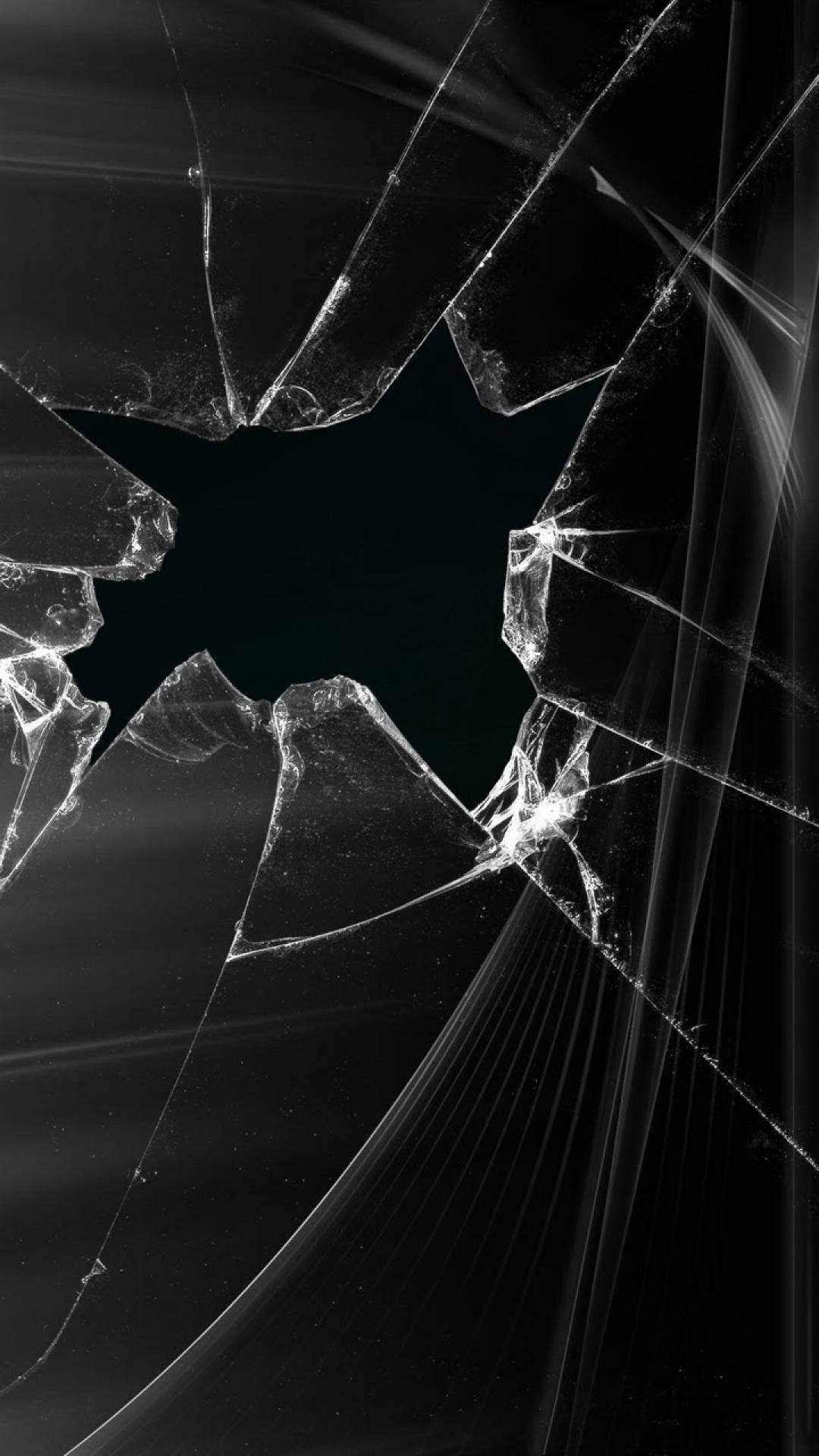 Picture Of Broken Glass With Hole Wallpaper
