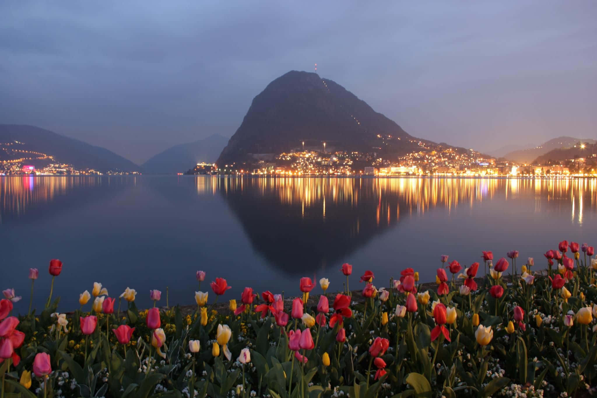 Picturesque Landscape Of Lugano Lake At Sunset Wallpaper