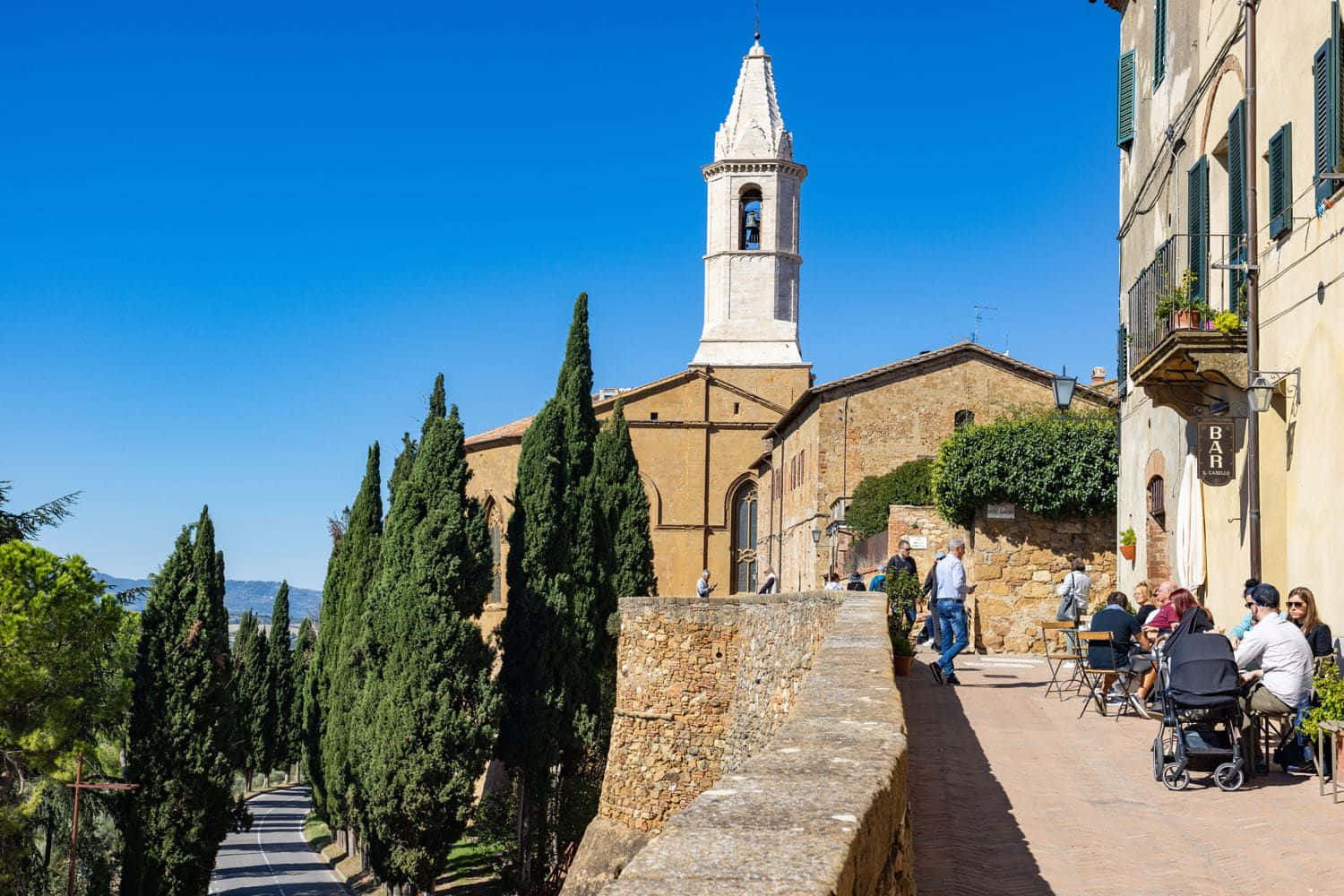 Pienza City Walls With Historical Bell Tower Wallpaper