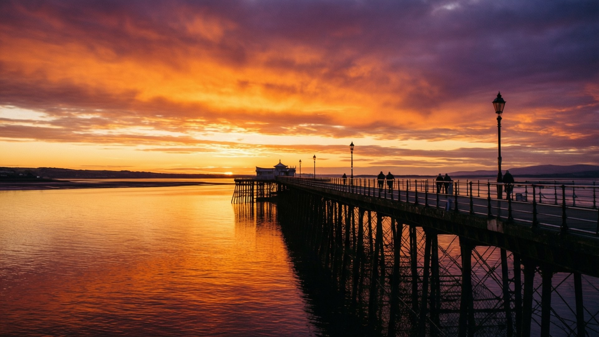 Solnedgang ved Bangor Pier med refleksioner