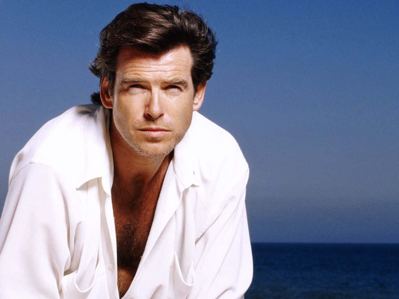 Pierce Brosnan during the early years of his film career Wallpaper