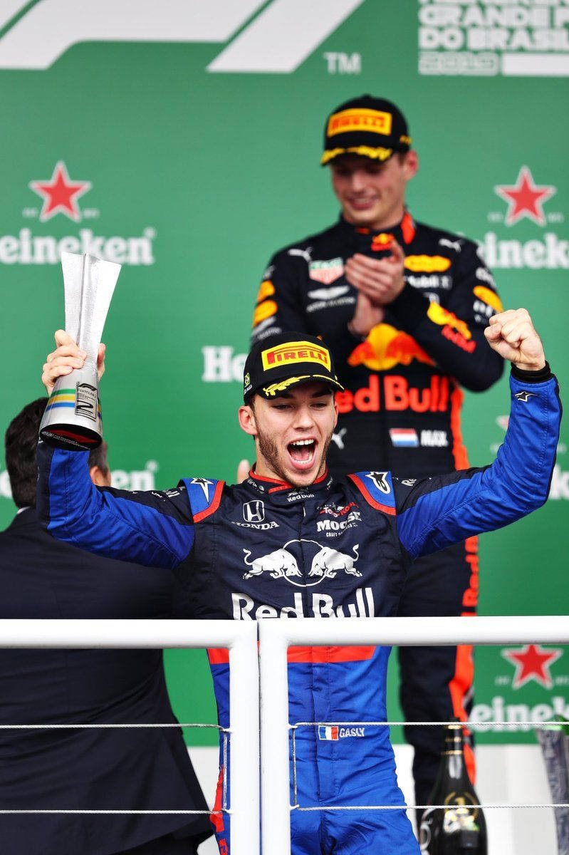 Caption: F1 Driver Pierre Gasly Celebrating Victory Wallpaper