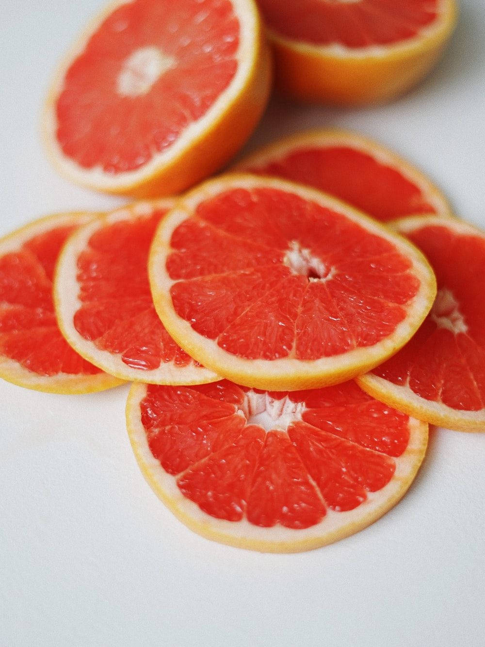 Refreshing Thinly Sliced Grapefruits Wallpaper