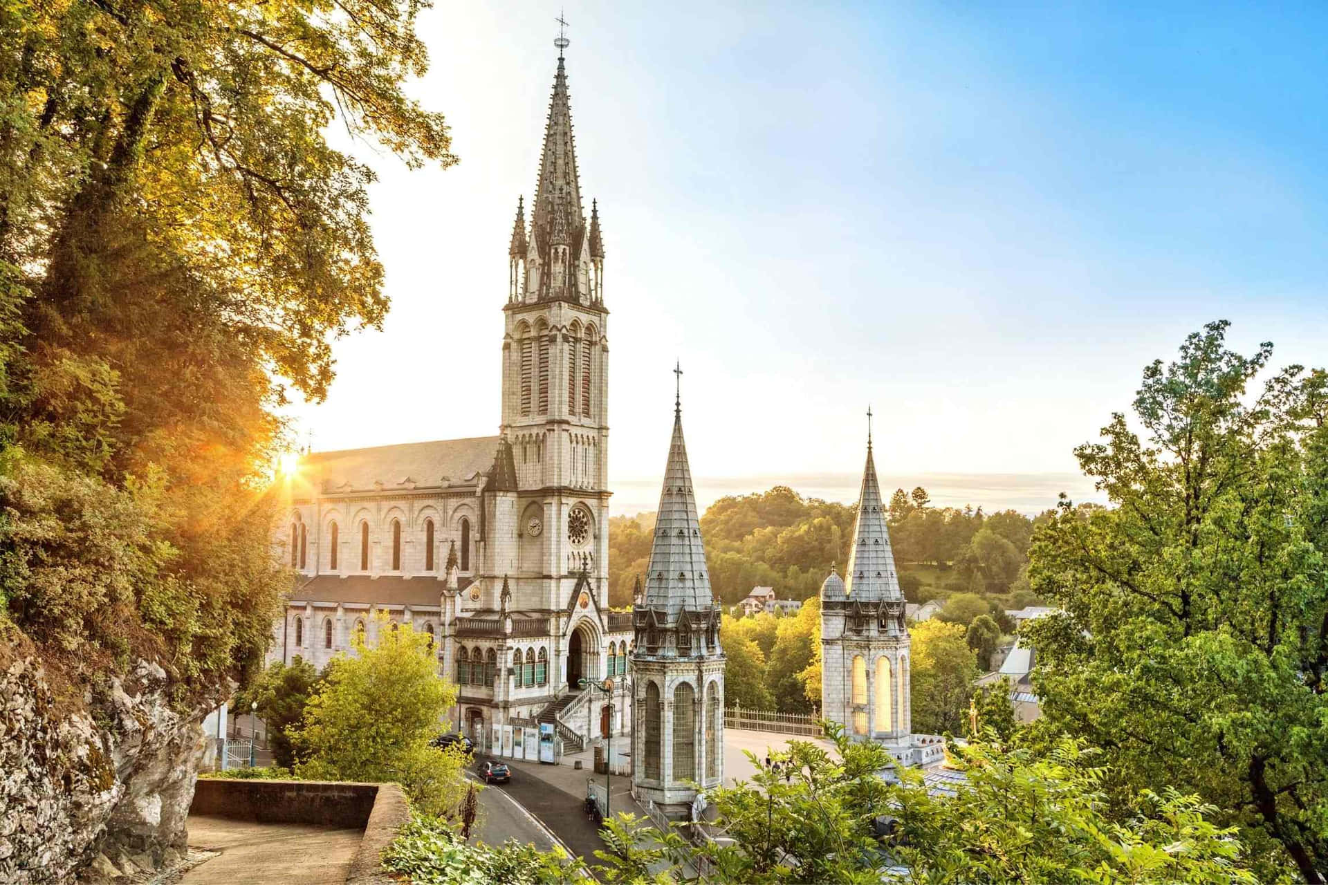 Pilgrimage Tranquility At Lourdes Sanctuary Wallpaper