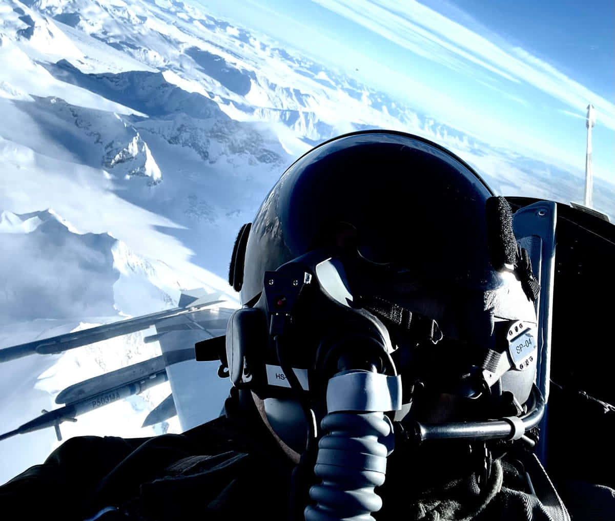 Pilot Over Snowy Mountains Wallpaper