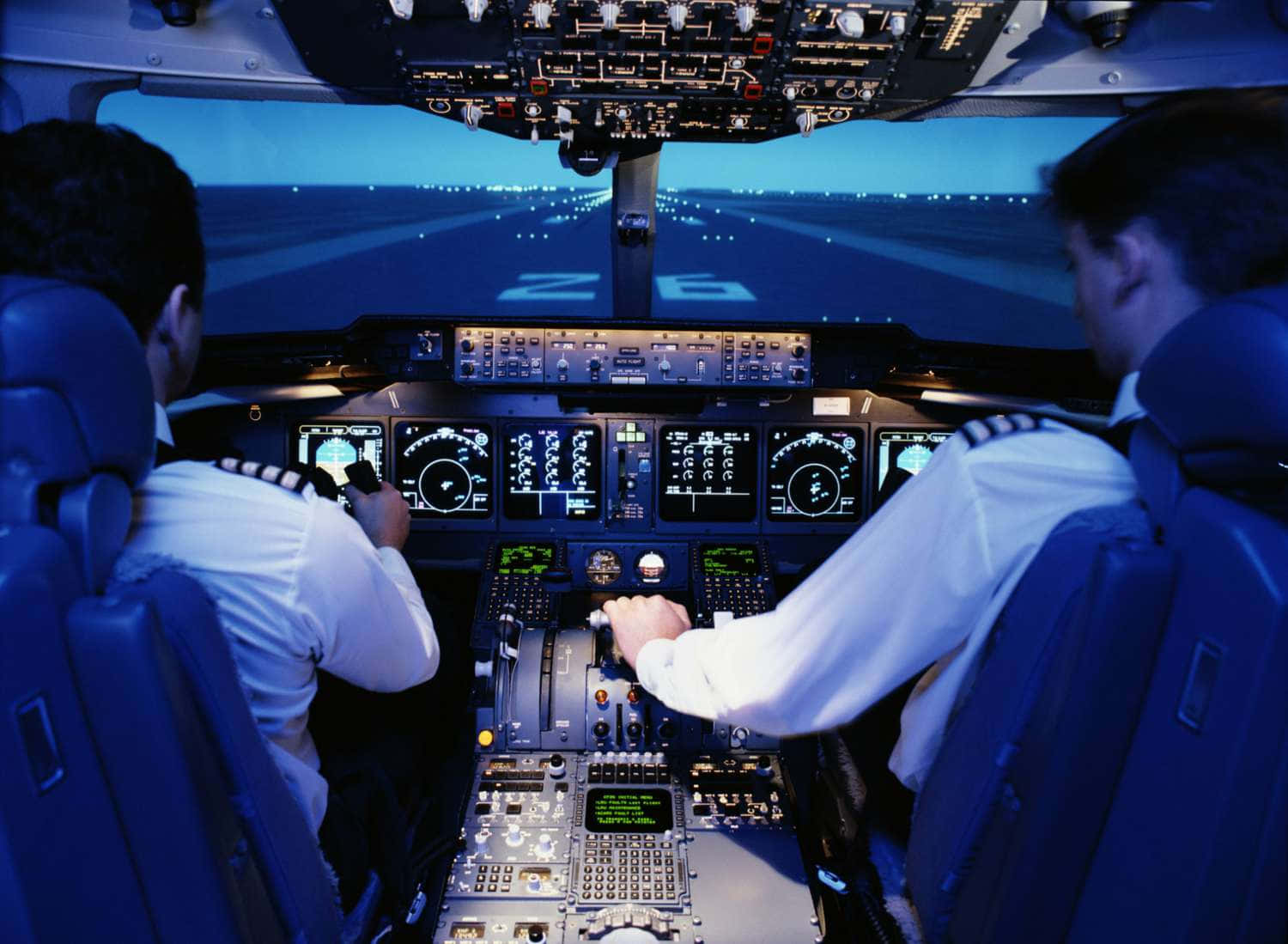 Tvåpiloter I Flygplan På Natten Bild