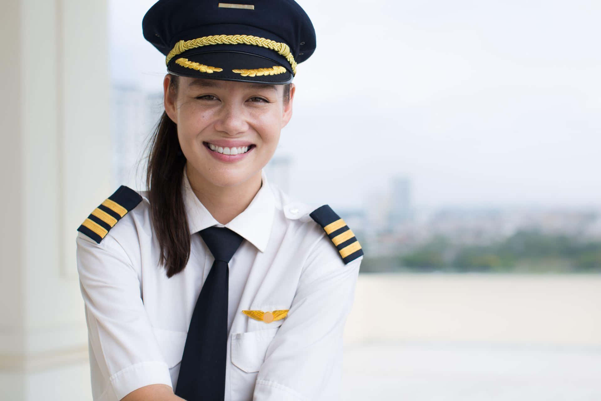Beautiful Female Pilot Smiling Picture