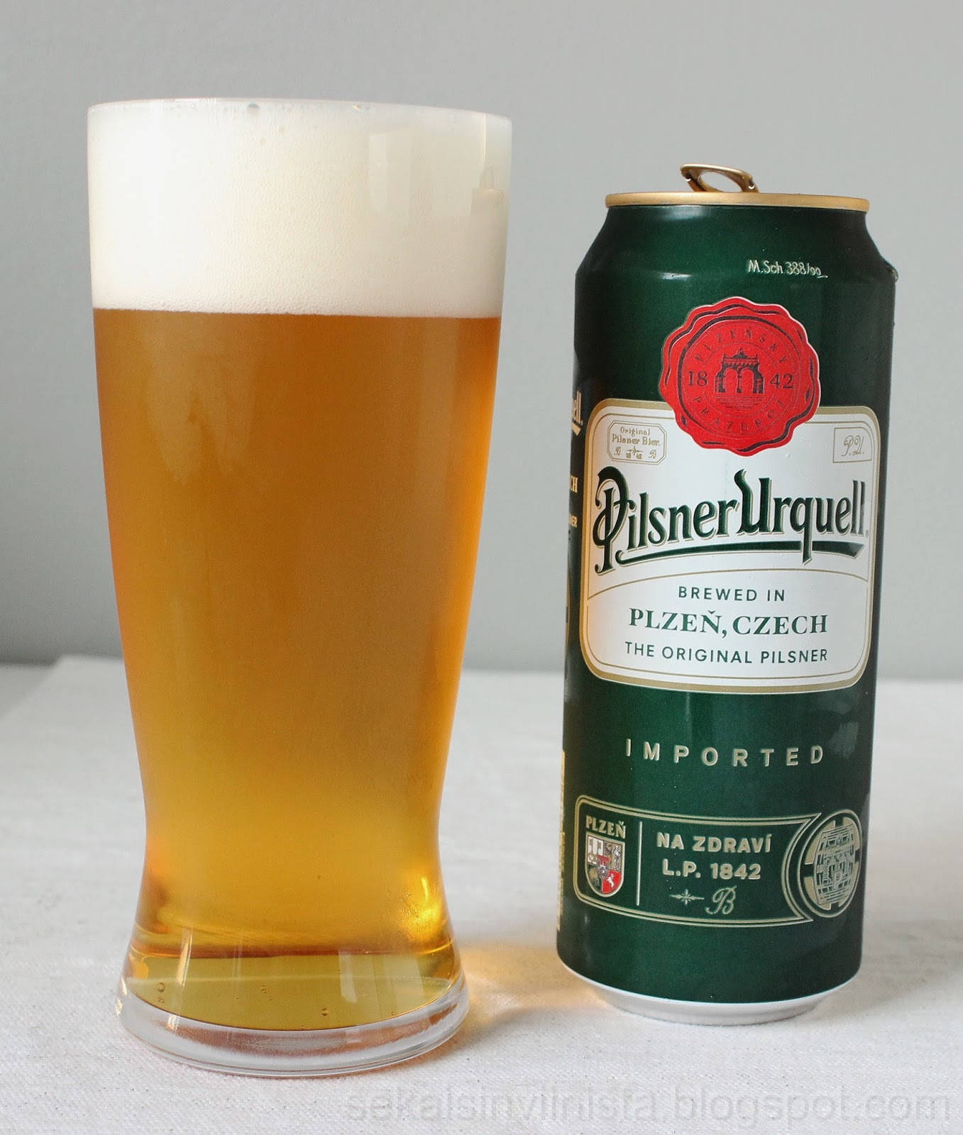 Download Pilsner Urquell Beer On Can Wallpaper | Wallpapers.com