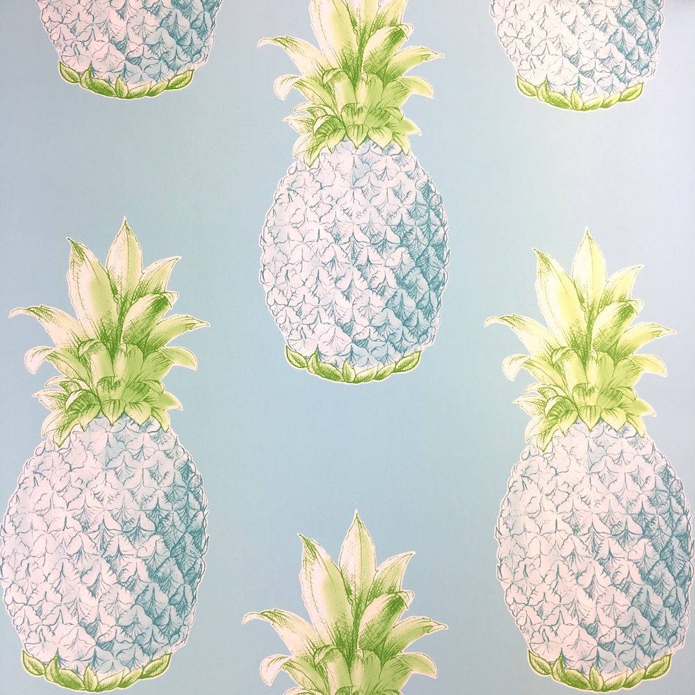 Nyd de levende farver fra en frisk Ananas! Wallpaper