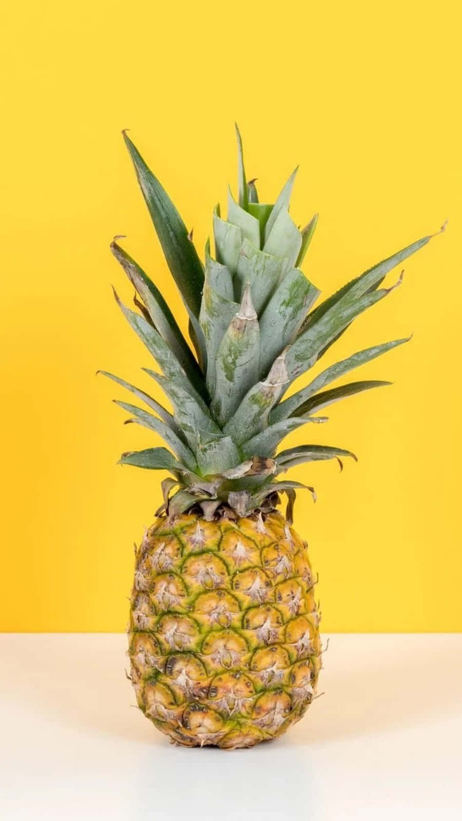 A bright, ripe and juicy pineapple for a refreshing snack