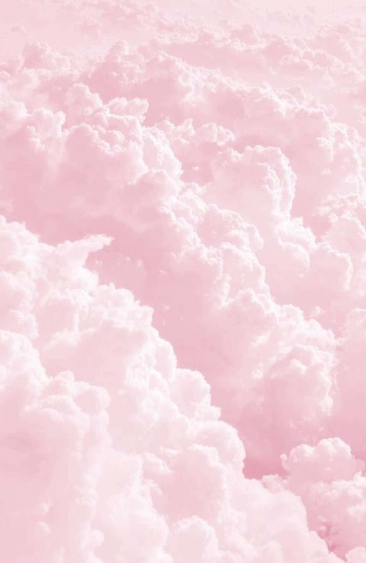 Fondode Pantalla Estético De Nubes Gruesas Y Esponjosas De Color Rosa.
