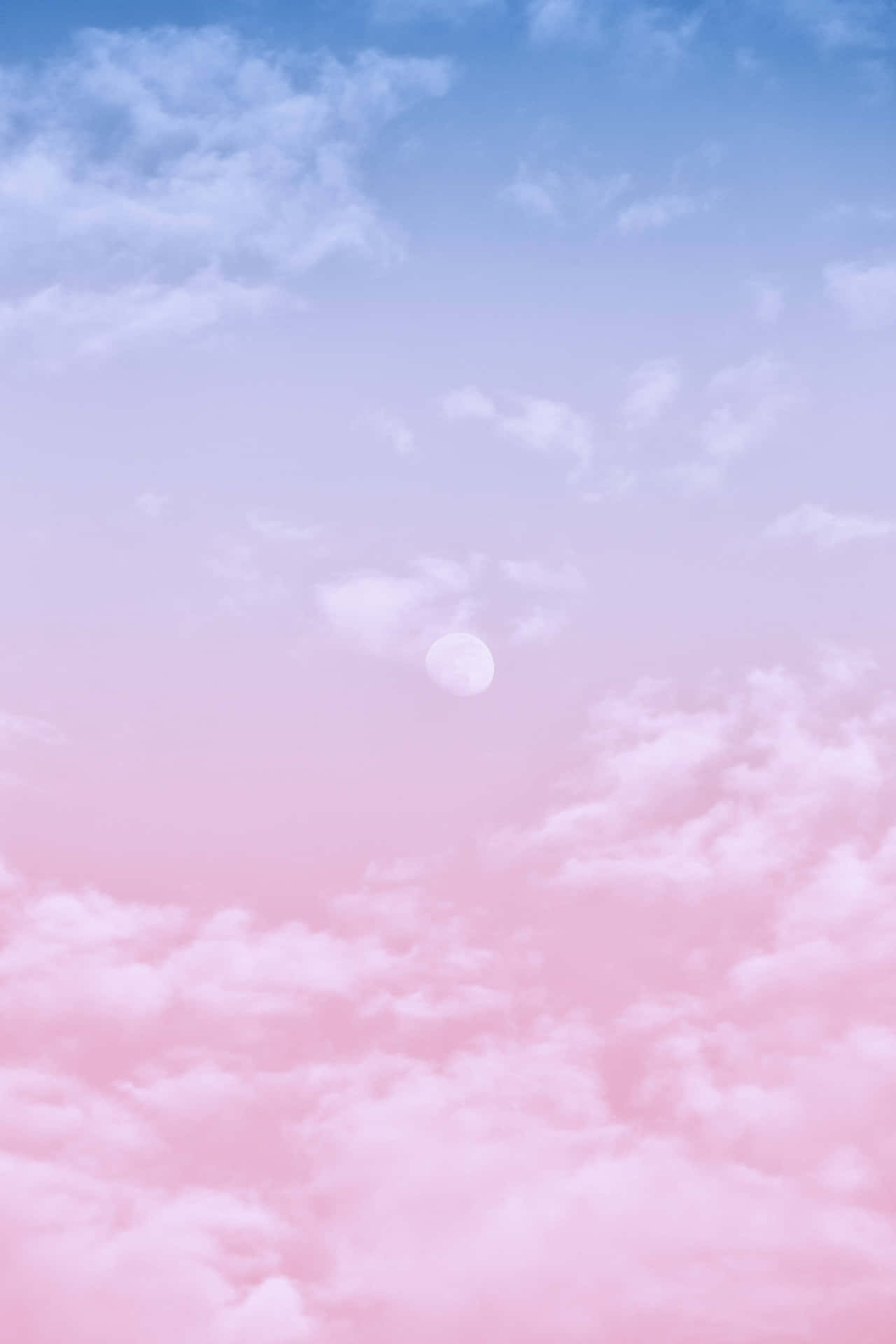 A beautiful sunset sky with pink and blue clouds Wallpaper