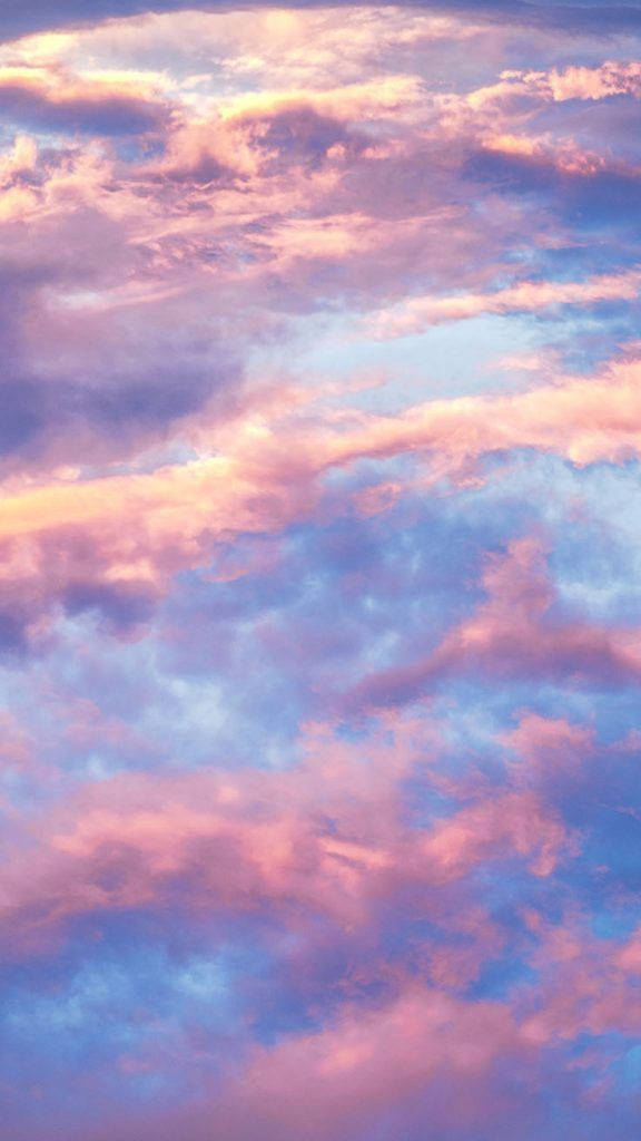 Estéticade Nuvens Rosa E Azul. Papel de Parede