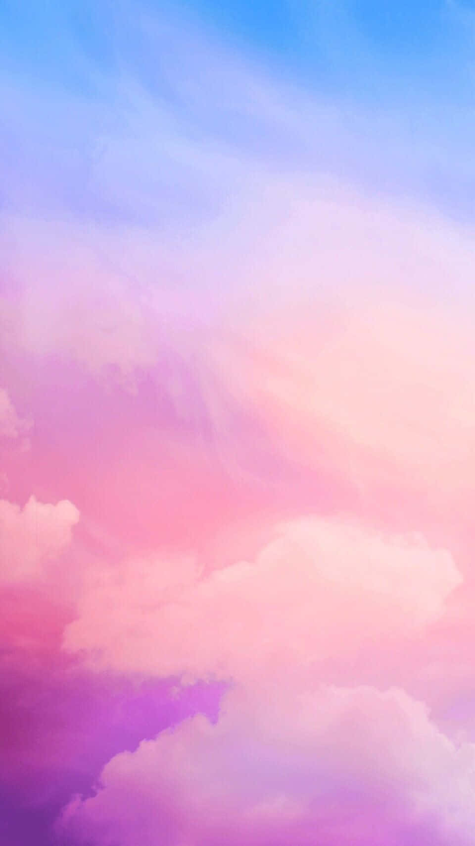 En lyserød og lilla himmel med skyer Wallpaper