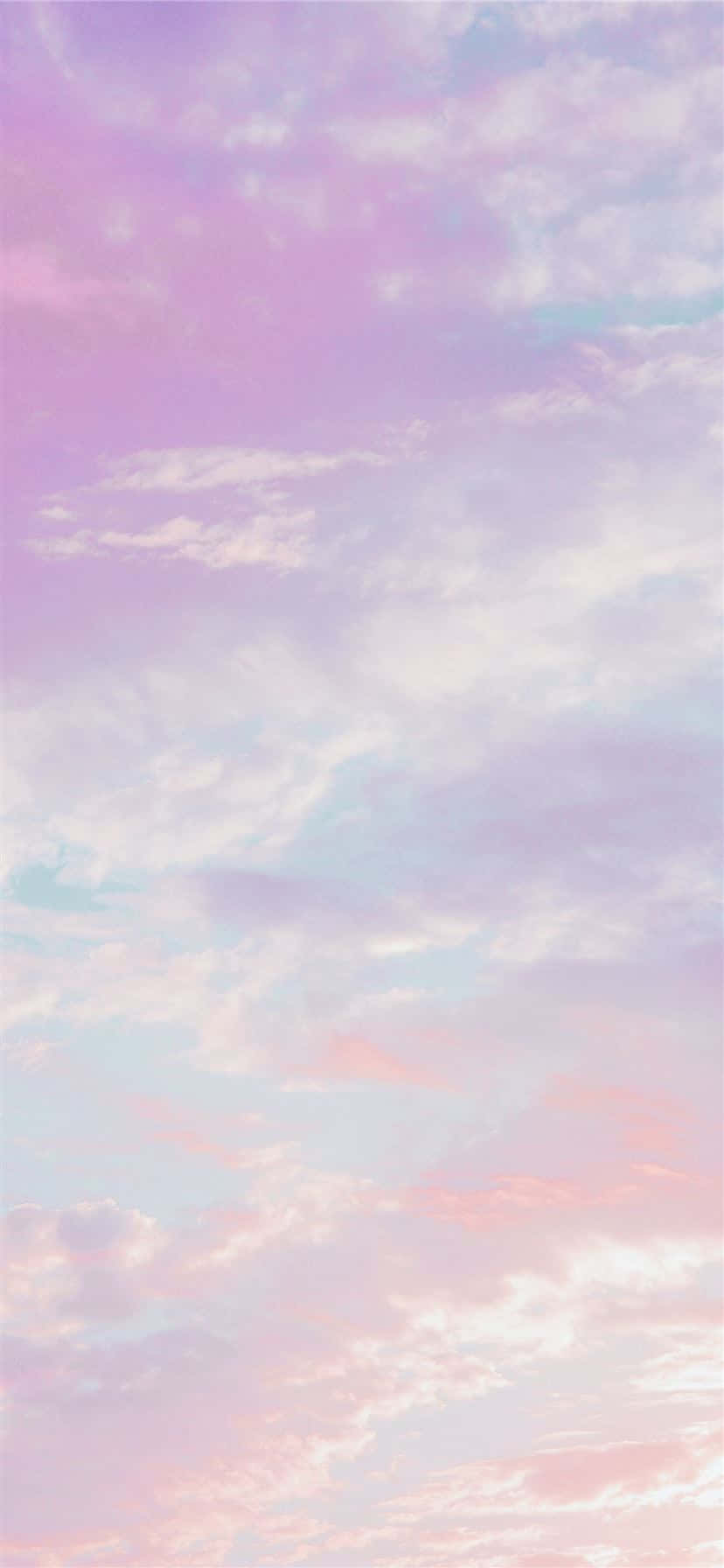 "Surreal Sunrise — A Colorful Display of Pink and Blue Clouds in the Morning Sky" Wallpaper