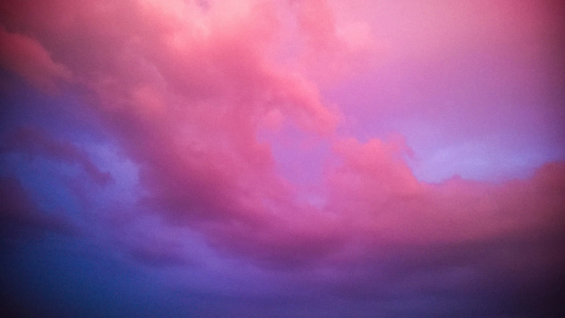 Goditila Bellezza Del Cielo Con Nuvole Rosa E Azzurre Mozzafiato. Sfondo