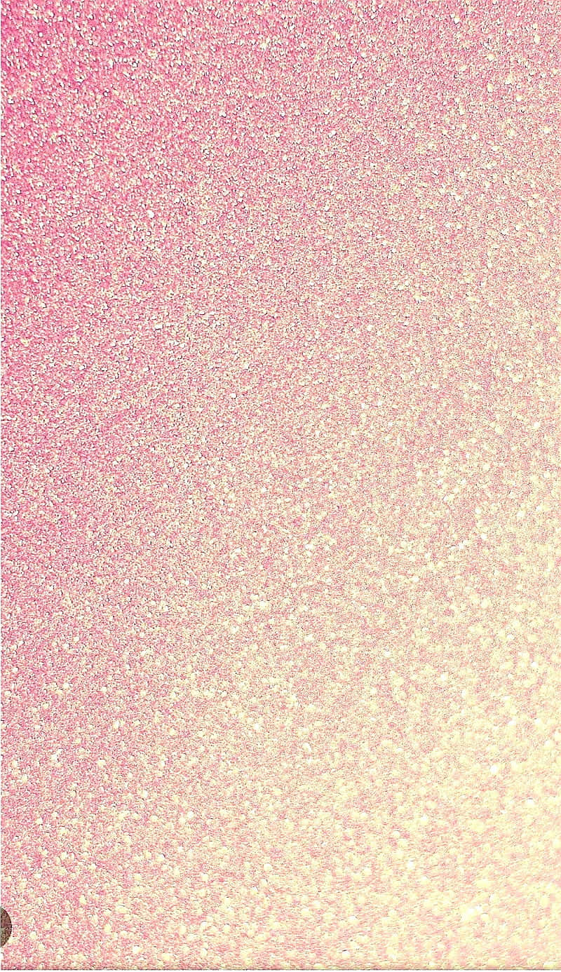 A Pink And Gold Glittery Background Wallpaper
