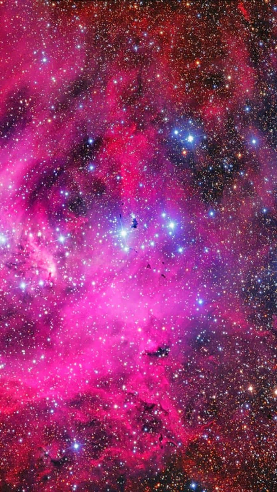 En ætherisk lyserød og lilla galakse Wallpaper