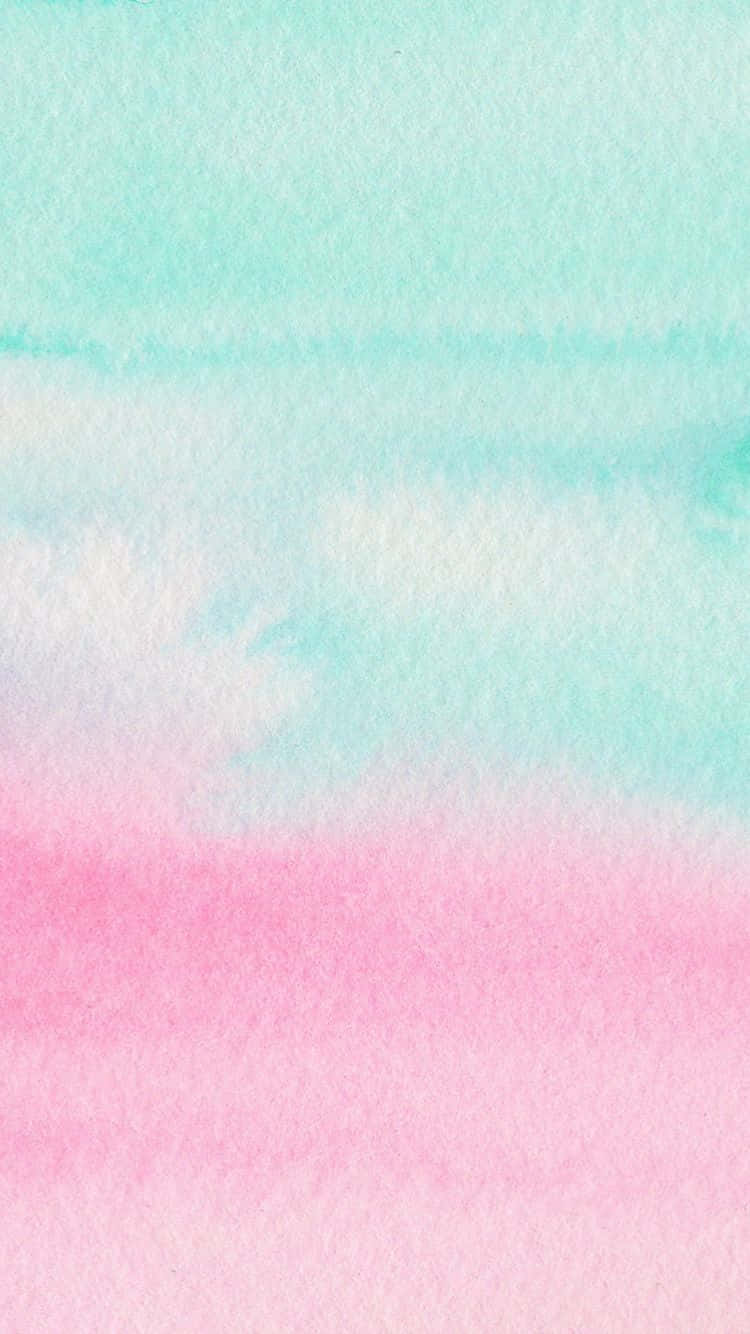 Et farverigt himmel udstiller de farver af pink og teal. Wallpaper