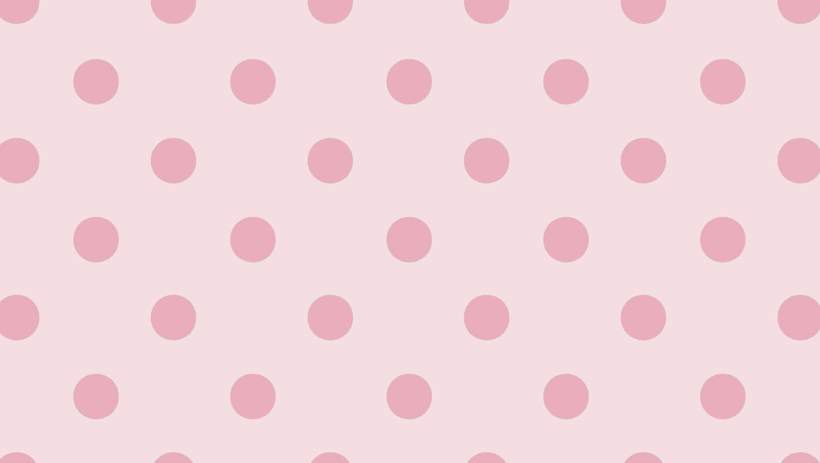 A beautiful pattern of pink and white polka dots. Wallpaper