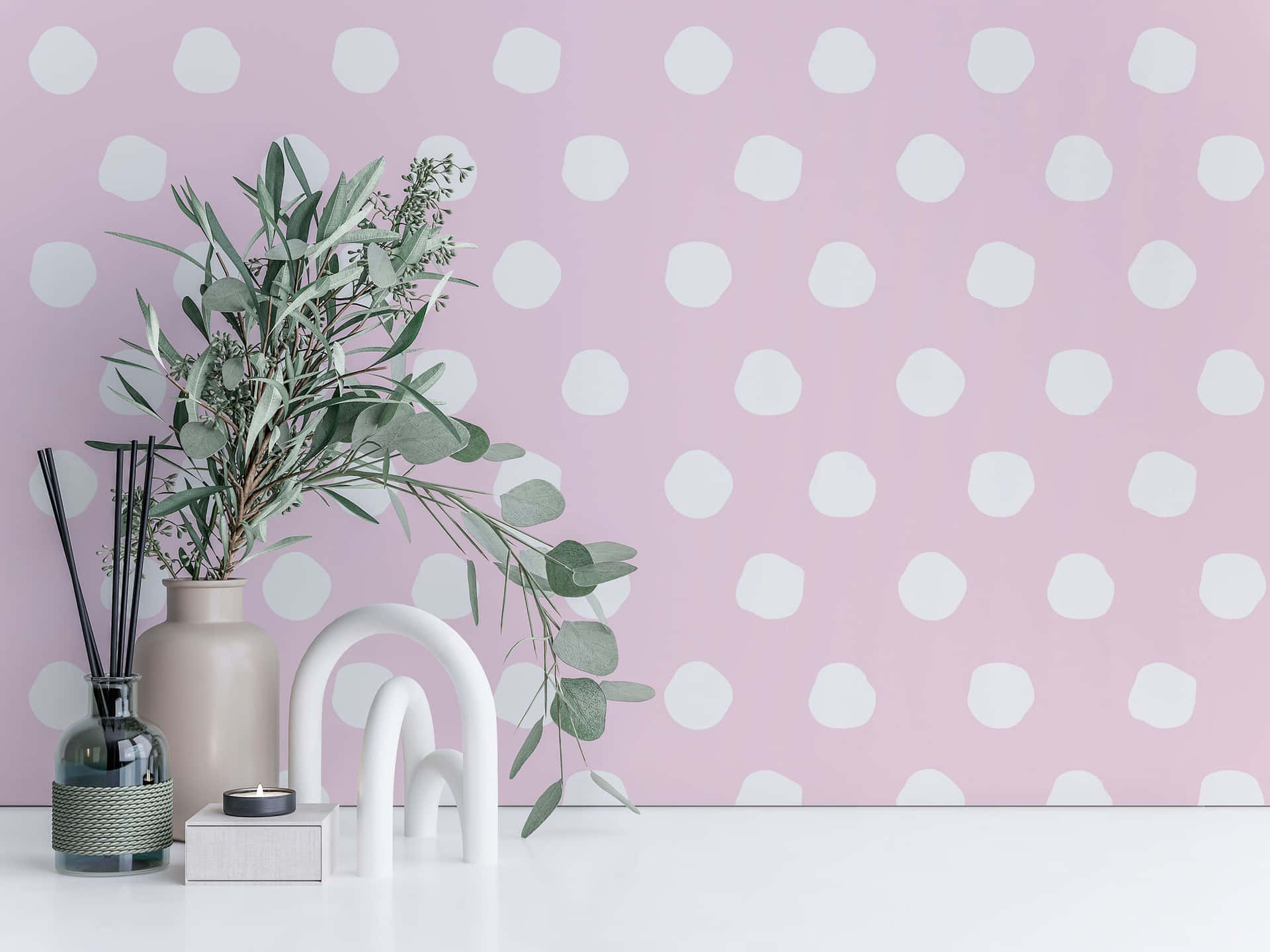 A Pink Wall With White Dots And A Vase Wallpaper