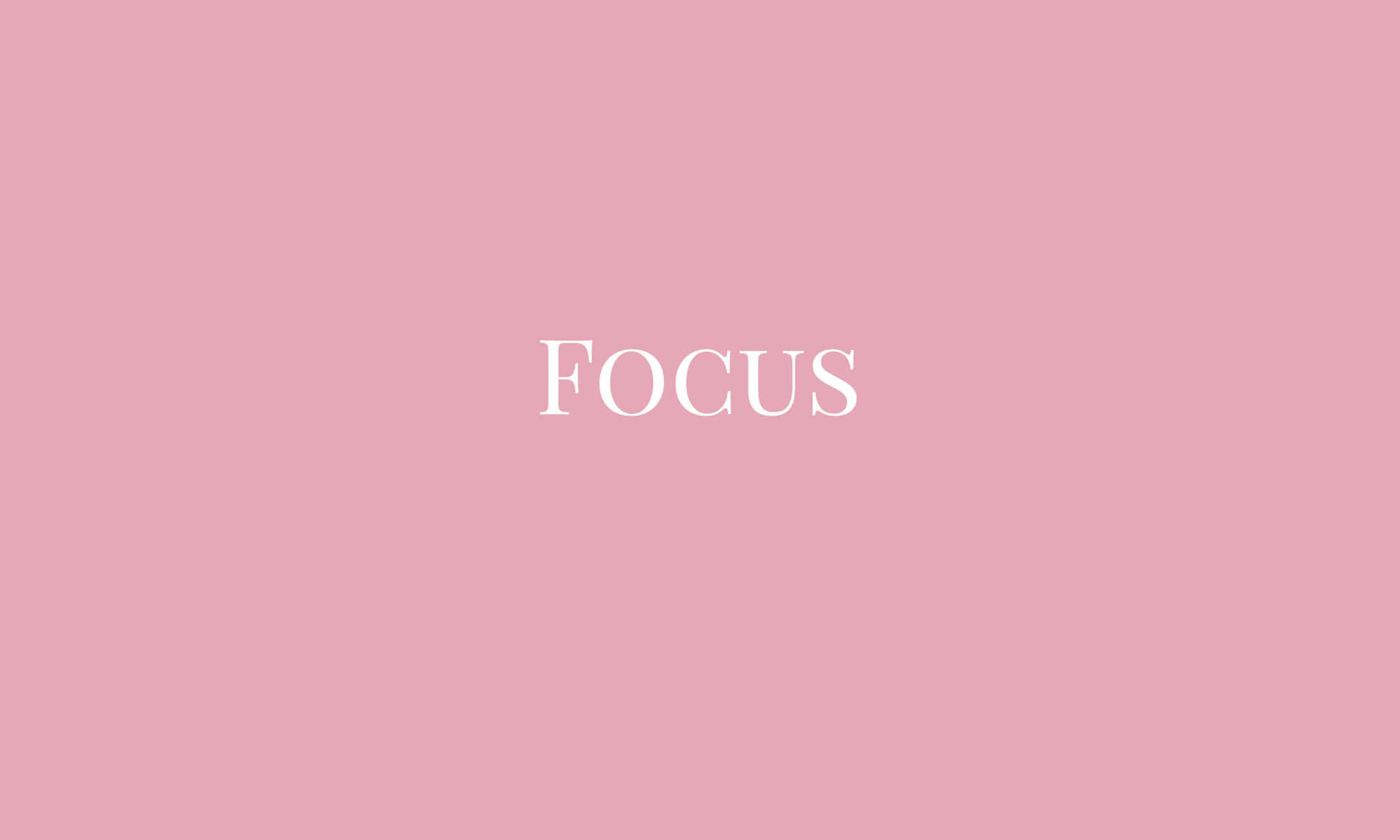 Fokus - et pink baggrund med ordet fokus i hvid skrift Wallpaper