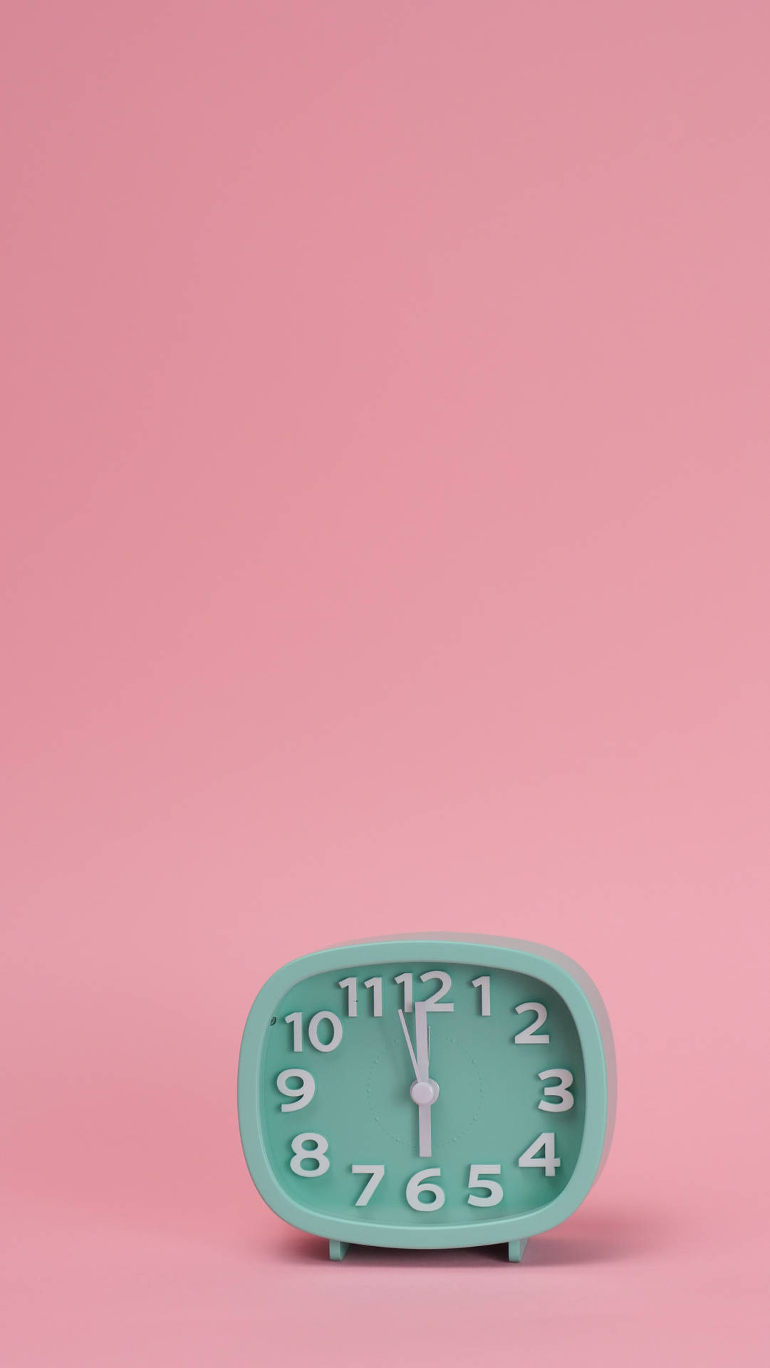 Pink Background With Clock Wallpaper