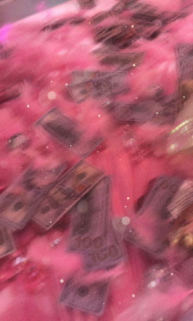 A Pink Table With Money On It Wallpaper