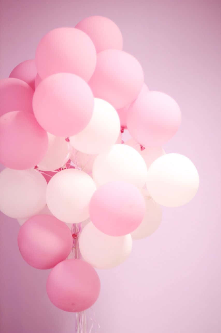 Pink And White Balloons On A Pink Wall