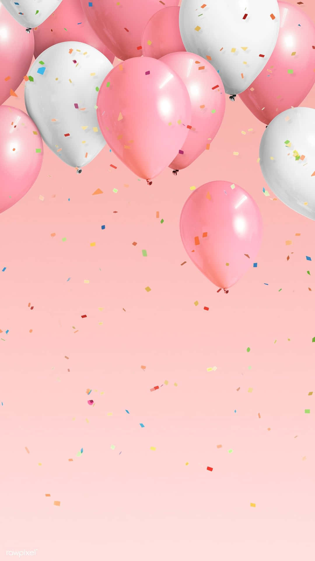 Pink And White Balloons Floating In The Air