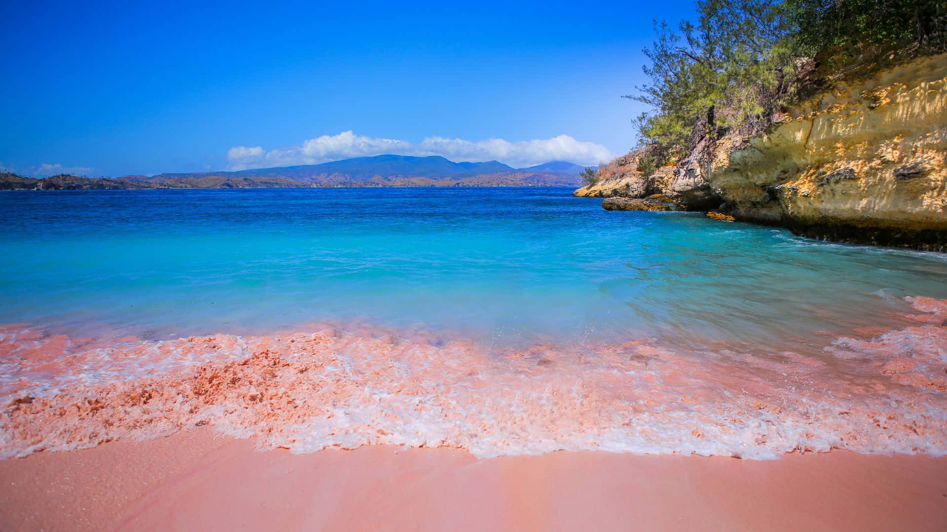 Tranquil Pink Beach Paradise Wallpaper