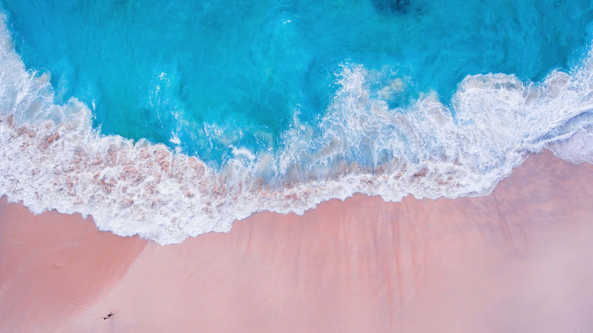 Serene Pink Beach Paradise Wallpaper