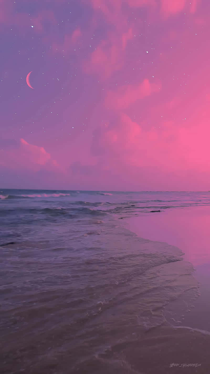 Disfrutade Un Hermoso Atardecer En La Playa Con Una Estética Rosa Y Tranquila. Fondo de pantalla