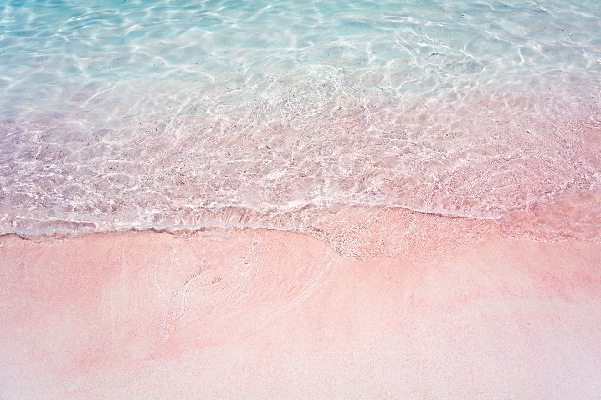 Disfrutade La Tranquilizadora Belleza De Una Playa Rosa. Fondo de pantalla