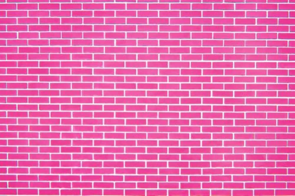 A vivid rosy take on an urban classic: pink brick wall.