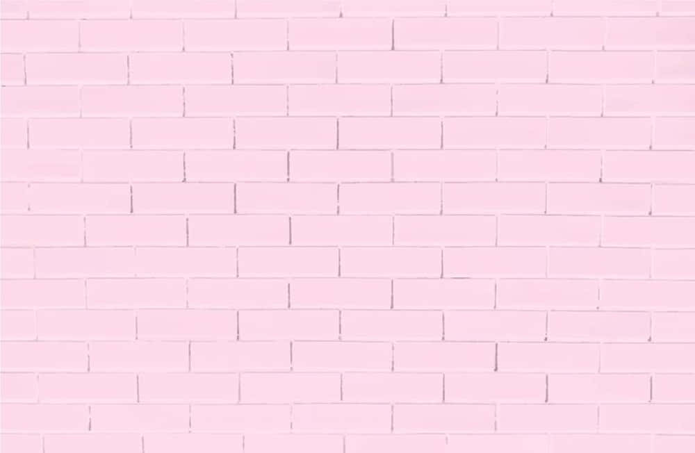 A Pink Brick Wall With White Bricks