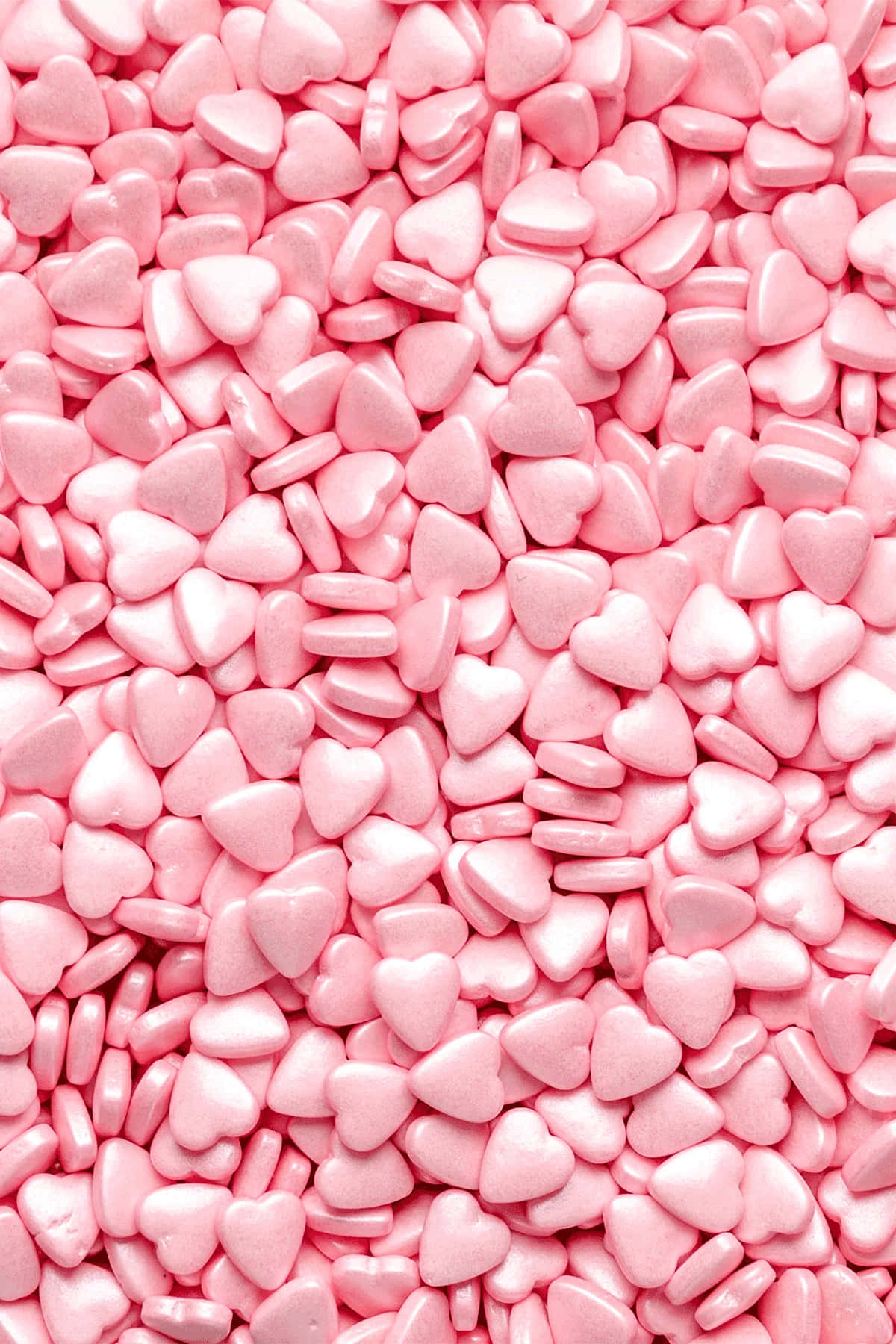 Sweet Temptation: Pink Candy Delight Wallpaper