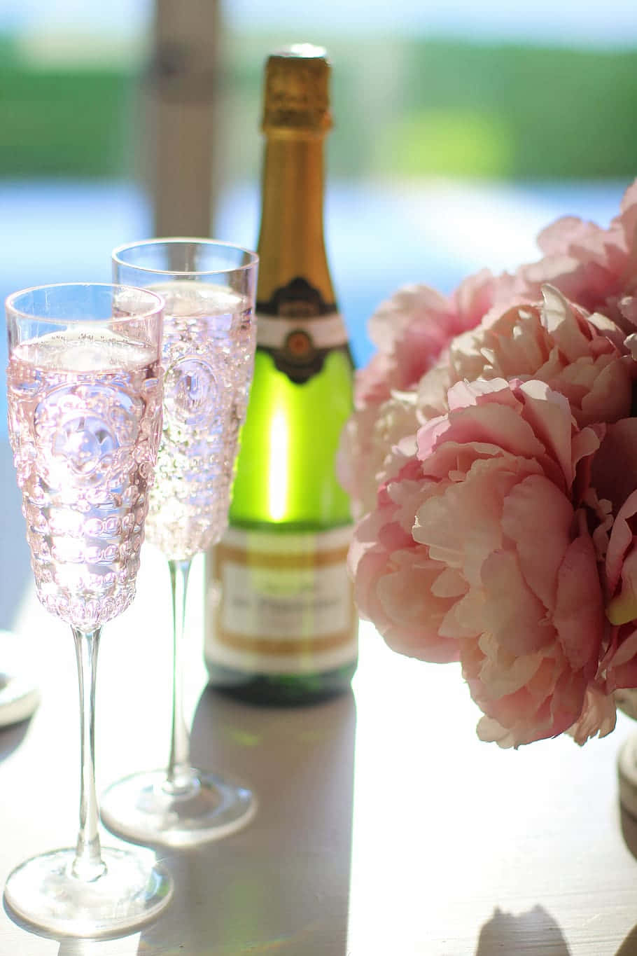 A Toast to Elegance with Pink Champagne Wallpaper